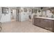 Bright living area featuring neutral paint colors, wood look floors, and multiple entryways at 10016 Morgan Mill Rd, Monroe, NC 28110