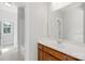 This bathroom features a vanity, modern fixtures, a white sink and a mirror at 10024 Hazelview Dr, Charlotte, NC 28277