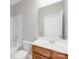 This bathroom features a shower and tub combination along with a vanity with sink at 10024 Hazelview Dr, Charlotte, NC 28277