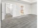 Carpeted bedroom with bright lighting, with views to ensuite bathroom and upstairs hall at 10024 Hazelview Dr, Charlotte, NC 28277