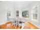 Dining area with hardwood floors, natural light and access to the outdoors, perfect for entertaining guests at 10024 Hazelview Dr, Charlotte, NC 28277