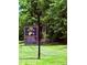 Community sign with directions to clubhouse, golf course, and pro shop at 10317 Clubhouse View Ln, Mint Hill, NC 28227