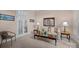 Cozy living room featuring large windows and neutral decor at 10317 Clubhouse View Ln, Mint Hill, NC 28227