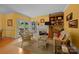 Comfortable sitting area with a fireplace, and plenty of natural light at 10317 Clubhouse View Ln, Mint Hill, NC 28227