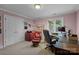 Home office featuring a spacious desk, comfortable seating, and ample natural light at 10317 Clubhouse View Ln, Mint Hill, NC 28227