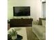 Comfortable living area showcasing stylish furniture, a modern TV, and contemporary decor at 104 Bunker Way # 1001, Mooresville, NC 28117