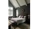 Serene main bedroom with vaulted ceilings, neutral tones, and large windows for natural light at 104 Bunker Way # 1001, Mooresville, NC 28117