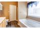 This is a bathroom with a bathtub, shower, toilet, and vanity at 10927 Chrudan Dr, Charlotte, NC 28262