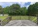 Spacious back deck overlooking lush backyard perfect for entertaining and enjoying the outdoors at 1274 Carpenter Springs Dr, Dallas, NC 28034