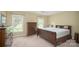 Cozy main bedroom with neutral walls, ample closet space, and an abundance of light at 1274 Carpenter Springs Dr, Dallas, NC 28034