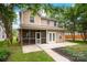 Backyard with a sunroom and patio at 14034 Cedar Pond Cir, Huntersville, NC 28078