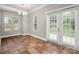 Cozy breakfast nook with tile flooring and sliding glass doors to the backyard at 14034 Cedar Pond Cir, Huntersville, NC 28078