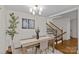Sunlit dining room featuring modern chandelier, hardwood floors, and a charming decor at 1814 Brookdale Ave, Charlotte, NC 28210