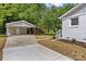 Charming home features a detached carport and a freshly manicured yard at 1814 Brookdale Ave, Charlotte, NC 28210