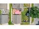 Aerial view showcasing the home's deck with umbrella, fenced backyard with outdoor seating, and landscaped surroundings at 186 Gresham Ln, Mooresville, NC 28117