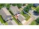 Beautiful aerial view of the property showcasing the home, yard, patio, and surrounding neighborhood on a sunny day at 186 Gresham Ln, Mooresville, NC 28117