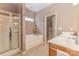 Bathroom featuring a shower, garden tub, and double sink vanity, offering a luxurious and functional space at 186 Gresham Ln, Mooresville, NC 28117