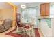 Cozy dining area with a round table, wine rack, and natural light at 186 Gresham Ln, Mooresville, NC 28117