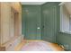 Stylish entryway with built-in storage, coat hooks, and a warm, inviting atmosphere at 188 Blarney Rd, Mooresville, NC 28117