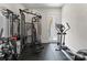 A modern gym featuring weights, machines, and an exterior door at 188 Blarney Rd, Mooresville, NC 28117