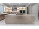 Bright kitchen featuring a large island, stainless steel appliances, and a sleek design at 188 Blarney Rd, Mooresville, NC 28117