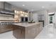 Well-equipped kitchen with a large island, stainless steel range, and modern cabinets at 188 Blarney Rd, Mooresville, NC 28117