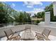 This rooftop deck features a seating area with views of the water and surrounding trees at 188 Blarney Rd, Mooresville, NC 28117