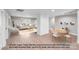 Open-concept living room connecting to a dining area, perfect for Gathering gatherings and entertaining at 2000 Tyvola Rd, Charlotte, NC 28210