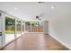 Sunroom with expansive windows showcasing a fully fenced backyard at 2000 Tyvola Rd, Charlotte, NC 28210
