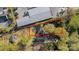 Aerial view showcasing the property layout, boundary, and location next to commercial building at 2201 Grimes St, Charlotte, NC 28206