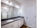 Primary bathroom features a double sink vanity, a shower, and a well-lit mirror at 2541 Ruby Dixon Crossing Dr # 18, Gastonia, NC 28056