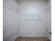 Walk-in closet with installed shelving for optimal storage space at 2541 Ruby Dixon Crossing Dr # 18, Gastonia, NC 28056