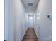 Bright hallway with wood flooring leading to the front door and other rooms at 2541 Ruby Dixon Crossing Dr # 18, Gastonia, NC 28056