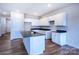 New kitchen featuring white cabinets, gray countertops, stainless sink, and wood-look flooring at 2541 Ruby Dixon Crossing Dr # 18, Gastonia, NC 28056