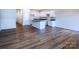 Modern kitchen features a central island, white cabinetry, and black countertops at 2541 Ruby Dixon Crossing Dr # 18, Gastonia, NC 28056