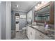 Bathroom features a granite countertop vanity and a decorative framed mirror at 2865 Water Plant Rd, Maiden, NC 28650