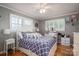 Bedroom with natural light, hardwood floors, a ceiling fan, and a vanity at 2865 Water Plant Rd, Maiden, NC 28650