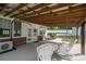 Relaxing covered patio with comfortable seating, perfect for enjoying the outdoors at 2865 Water Plant Rd, Maiden, NC 28650