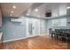 Bright dining area features French doors, wood floors, and stylish modern lighting at 2865 Water Plant Rd, Maiden, NC 28650