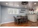 The dining room features wood flooring and natural lighting from the window at 2865 Water Plant Rd, Maiden, NC 28650