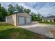 Exterior view featuring a large garage and the house with well-kept greenery at 2865 Water Plant Rd, Maiden, NC 28650