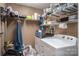 Well-organized laundry room with plenty of storage and a washer and dryer at 2865 Water Plant Rd, Maiden, NC 28650