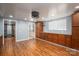 Spacious living area features wood floors, natural light, and abundant cabinet space at 2865 Water Plant Rd, Maiden, NC 28650