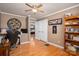 Office space with hardwood floors, natural light, and built-in bookshelves at 2865 Water Plant Rd, Maiden, NC 28650