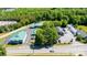 Aerial view of buildings and parking lots surrounded by trees at 3042 N Oxford St, Claremont, NC 28610