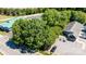 Aerial view of a building and a parking lot surrounded by trees at 3042 N Oxford St, Claremont, NC 28610