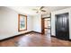Bedroom showcasing hardwood floors, a window, and a closet, providing a versatile living space at 3042 N Oxford St, Claremont, NC 28610