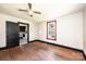 Bedroom featuring a ceiling fan, hardwood floors, and natural light offers a comfortable and customizable space at 3042 N Oxford St, Claremont, NC 28610