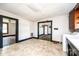 Functional kitchen area with neutral flooring, access to other rooms, and potential for customization at 3042 N Oxford St, Claremont, NC 28610