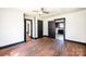 Spacious room with vintage charm showcasing hardwood floors and well-defined trim throughout at 3042 N Oxford St, Claremont, NC 28610